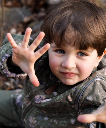 Small child showing hands