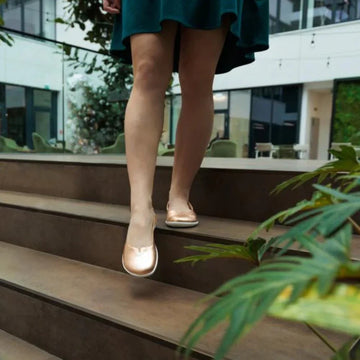 Woman wearing Be Lenka Women's Ballet Shoes Bellissima 2.0 - Rose Gold.