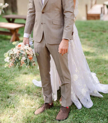 Man and woman wearing barefoot party shoes.