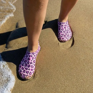 Adult wearing Slipfree Adults Janset Pool Shoes.