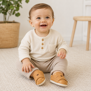 Child wearing Bobux SU Xplorer Critters Rummage Shoes - Pumpkin Spice.