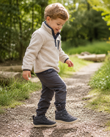 Boy wearing Vivobarefoot Kids Boots Gobi Hiber - Bristol Black.