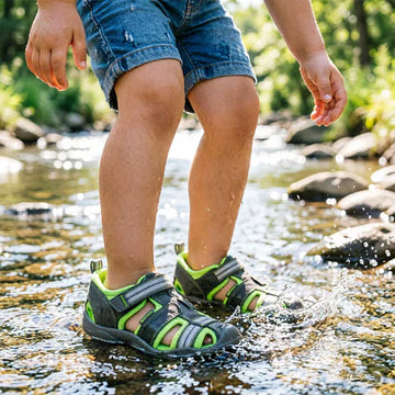 Child wearing Pediped Flex Kids Sahara Sandals - Grey and Lime.