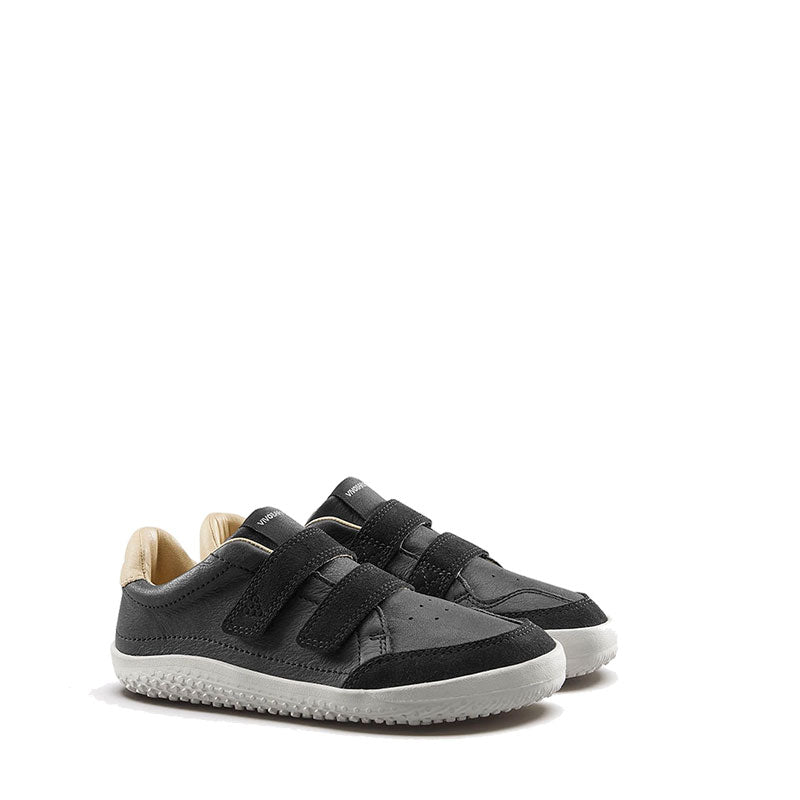 Pair of Vivobarefoot Kids Trainers Gobi - Obsidian, angled view showing outer side and front.