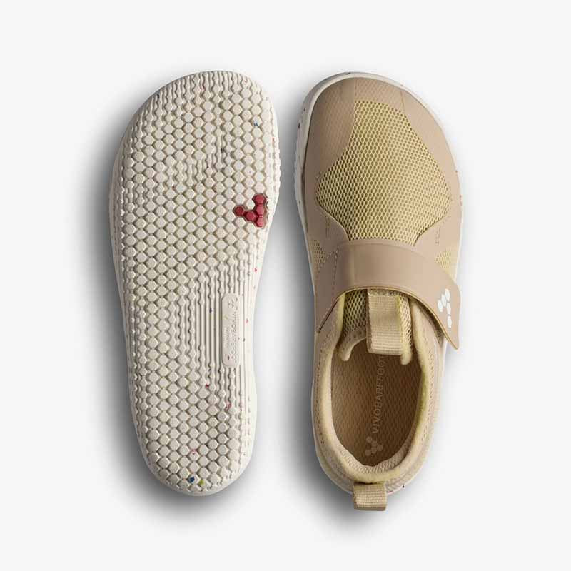 Pair of Vivobarefoot Kids Trainers Primus Sport IV - Stone, one showing the sole view and the other showing the top view.