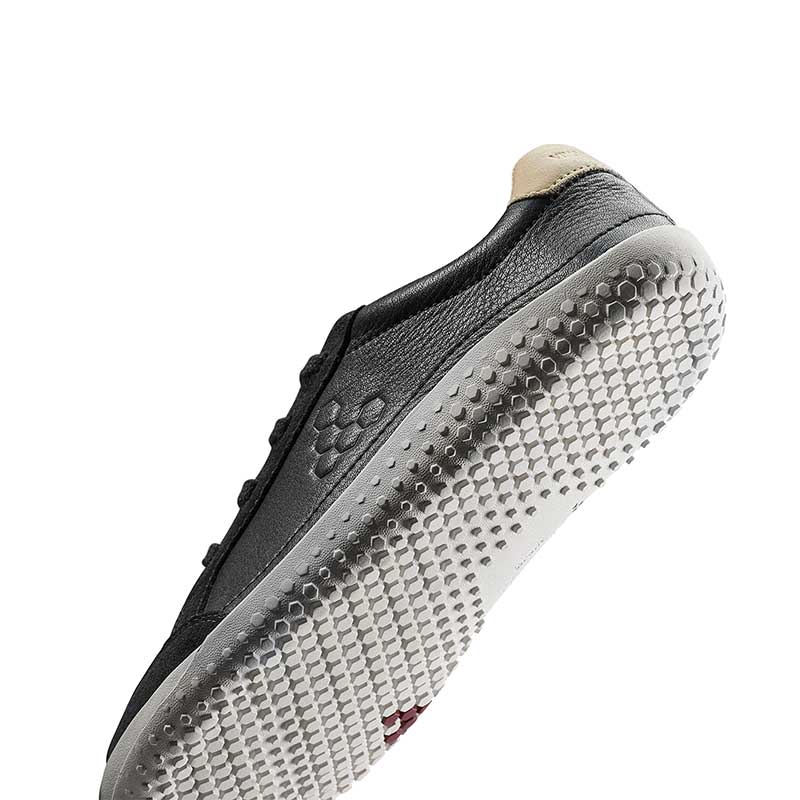 Vivobarefoot Junior Trainer Gobi - Obsidian, angled view showing sole.