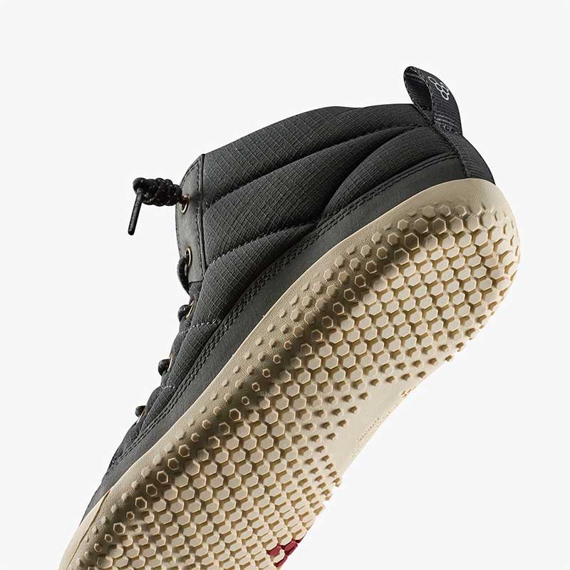 Vivobarefoot Junior Booto Gobi Hiber - Bristol Black, angled view showing sole.