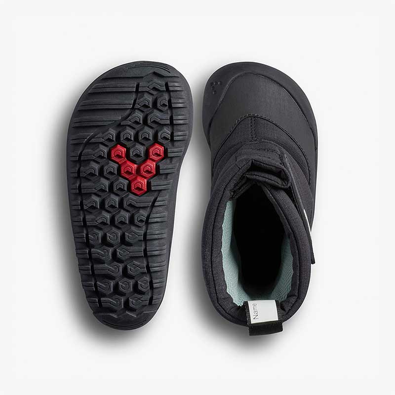 Pair of Vivobarefoot Toddler Boots Tracker AT - Obsidian, one showing the sole view and the other showing the top view.