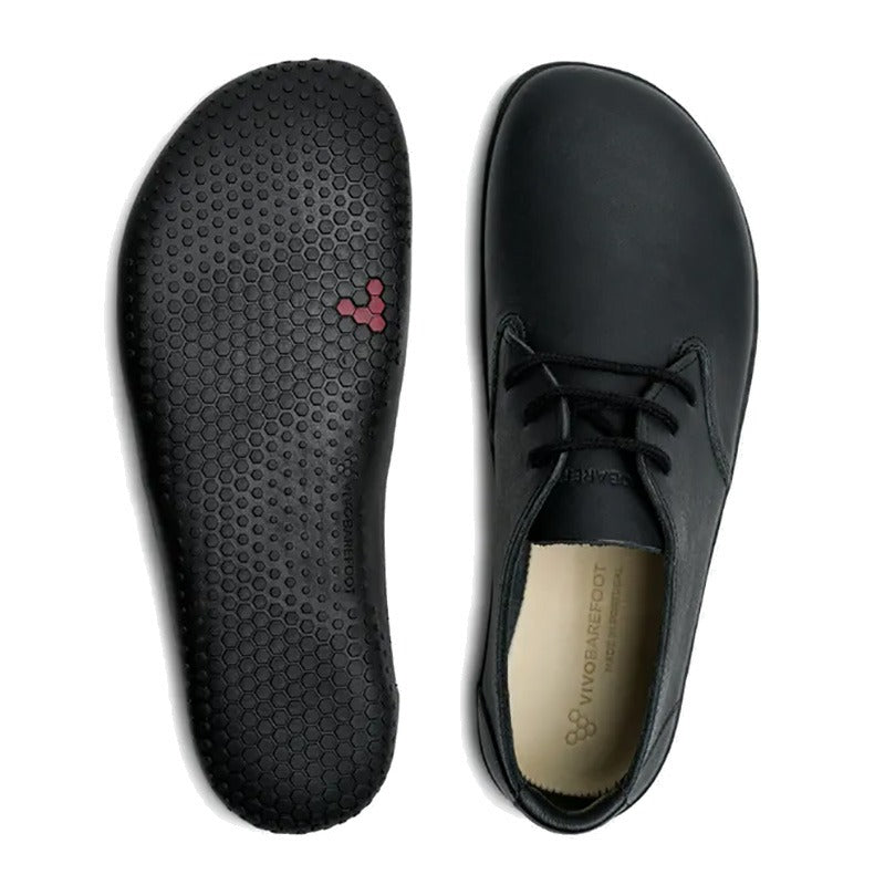 Pair of Vivobarefoot Women's Dress Shoes Ra - Obsidian, one showing the sole view and the other showing the top view.