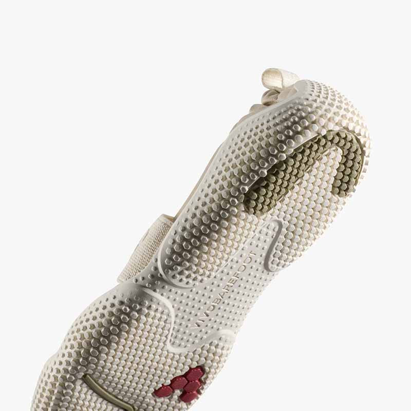 Vivobarefoot Women's Motus Studio Ballet Shoe - Sand, sole view.