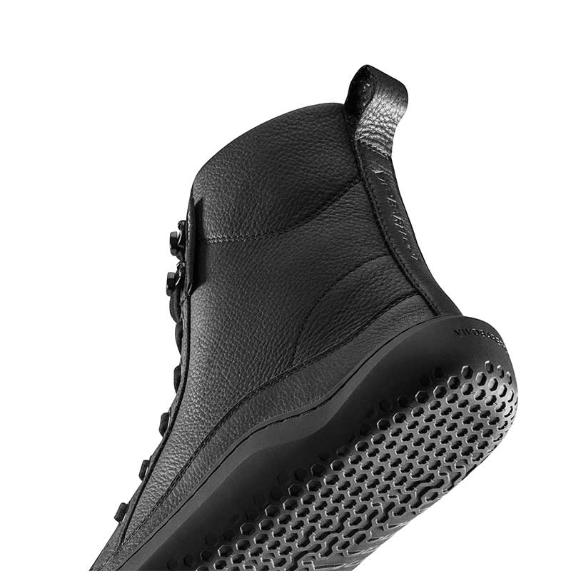 Vivobarefoot Women's Warmlined Boot Gobi - Obsidian, angled view showing the sole and side.