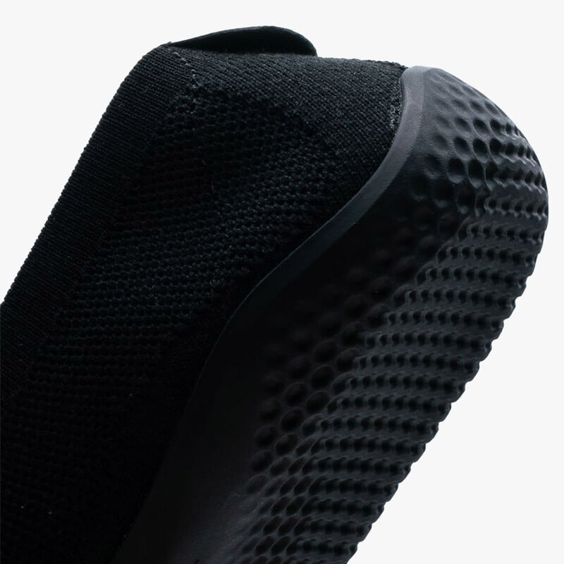 Vivobarefoot Women's Ballerina Shoes Asana Yin Knit - Obsidian, angled view showing the sole.