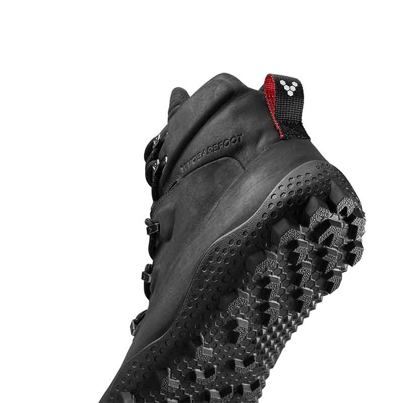 Vivobarefoot Women's Winter Boot Tracker SG - Obsidian, angled view showing the sole and side.