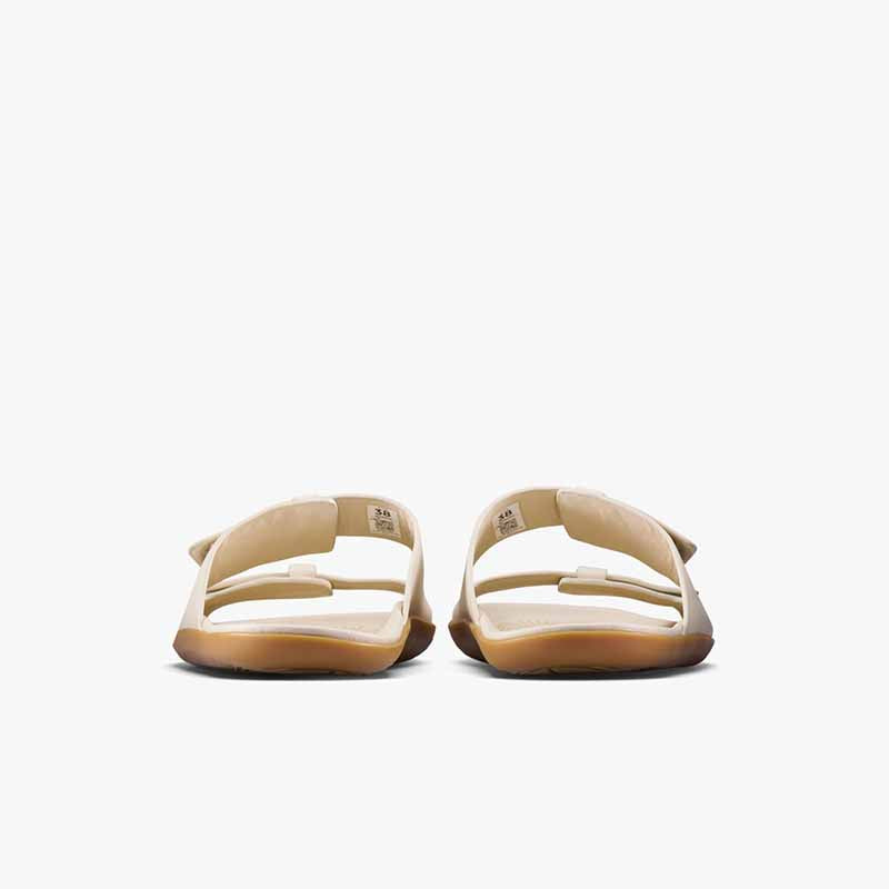 Pair of Vivobarefoot Women's Sandals Sensus Yin Slide - Sand, rear view.