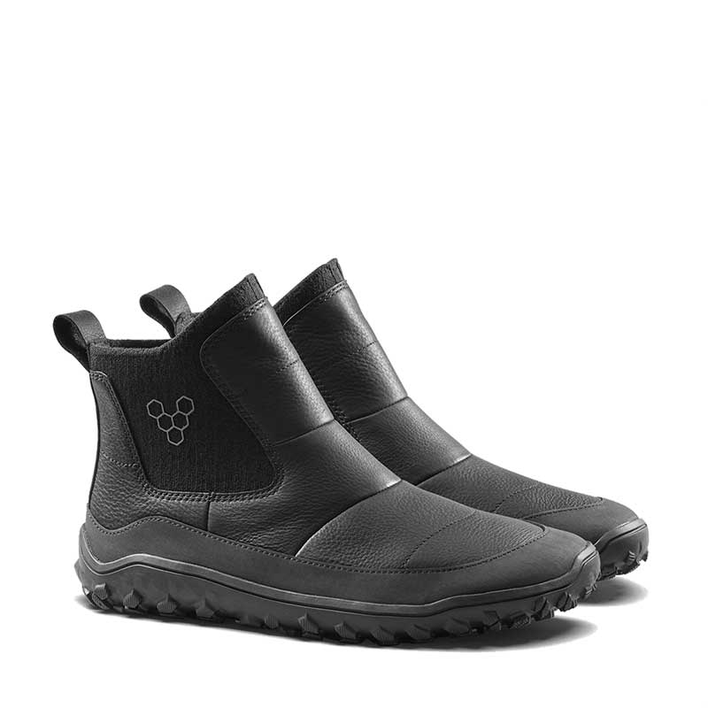 Pair of Vivobarefoot Women's Chelsea Boots Explorer - Obsidian, angled view showing the outer side and front.