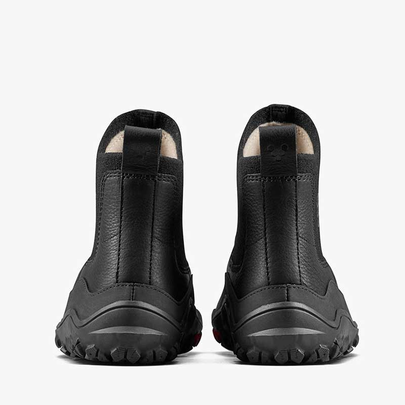 Pair of Vivobarefoot Women's Chelsea Boots Explorer - Obsidian, rear view.