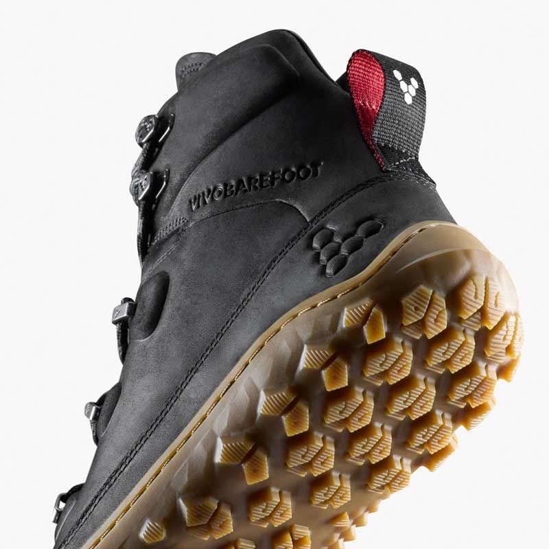 Vivobarefoot Women's Walking Boot Tracker Leather AT II - Obsidian, angled view showing the sole.