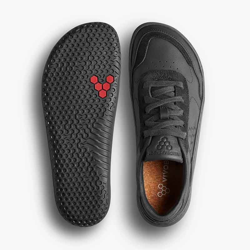Pair of Vivobarefoot Women's Leather Trainers Gobi - Obsidian, one showing the sole view and the other showing the top view.