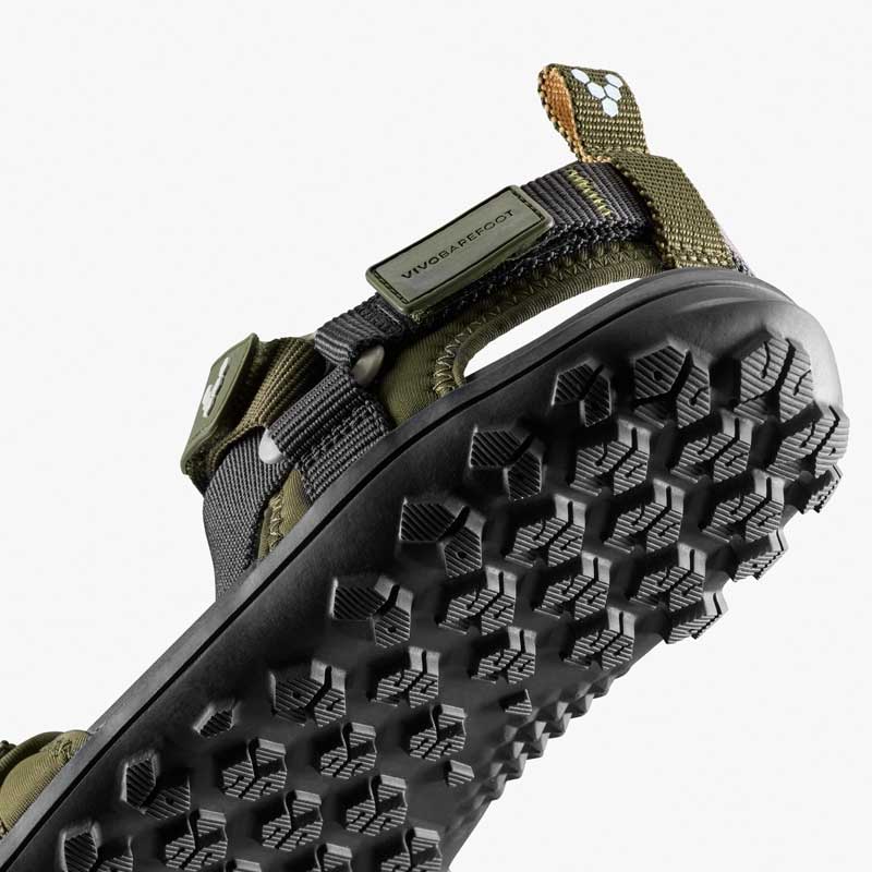 Vivobarefoot Women's Sandal Tracker Ora - Dark Olive, angled view showing the sole.