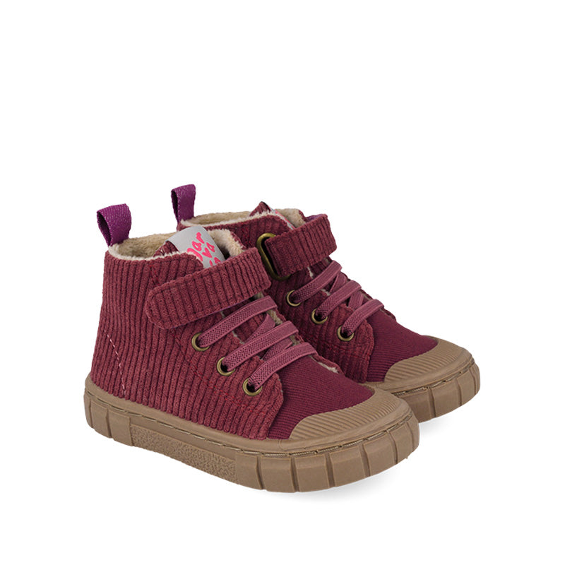 Pair of Garvalin Kids Boots - Purple, angled view showing outer side and front.