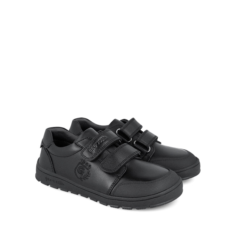 Pair of Garvalin Barefoot School Shoes - Black, angled view showing outer side and front.