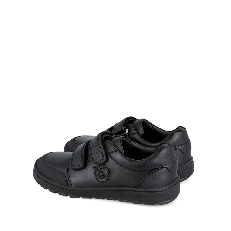 Pair of Garvalin Barefoot School Shoes - Black, angled view showing outer side and rear.