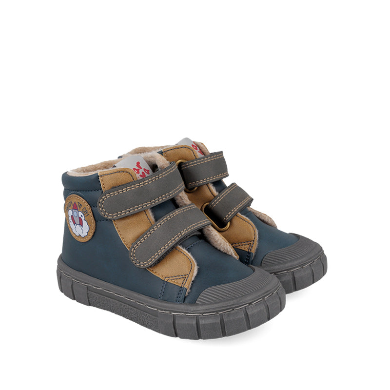 Pair of Garvalin Kids Barefoot Boots - Navy, angled view showing outer side and front.