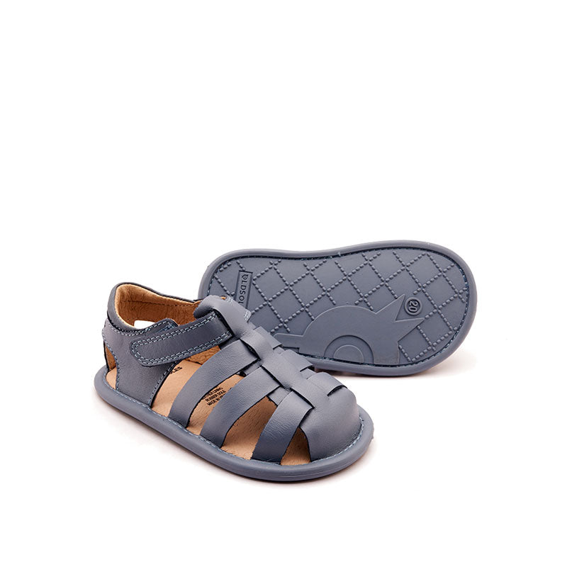 Pair of Old Soles Splash Away Sandals - Indigo, one angled showing outer side and front, the other on it's side showing the sole.