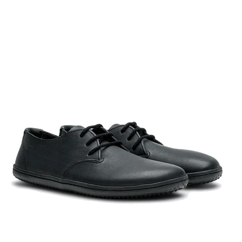 Pair of Vivobarefoot Men's Shoes Ra - Obsidian, angled view showing outer side and front.