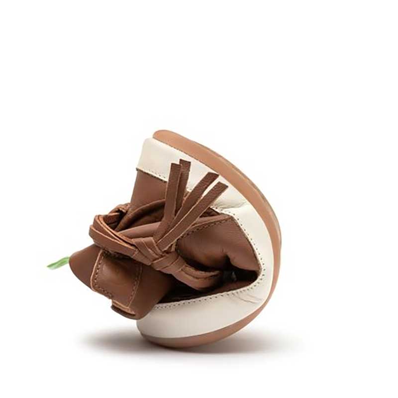 Tip Toey Joey Toddler Boot Ridgey - Burning Wood and Tapioca, curled up.