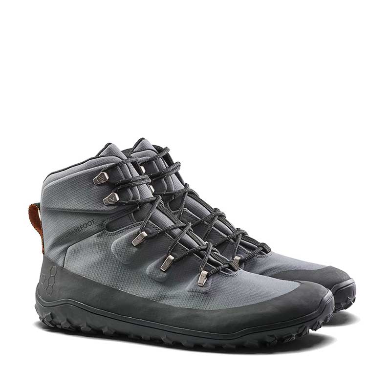 Pair of Vivobarefoot Men's Boots Tracker Textile AT - Dark Shadow, angled view showing the outer sole and front.