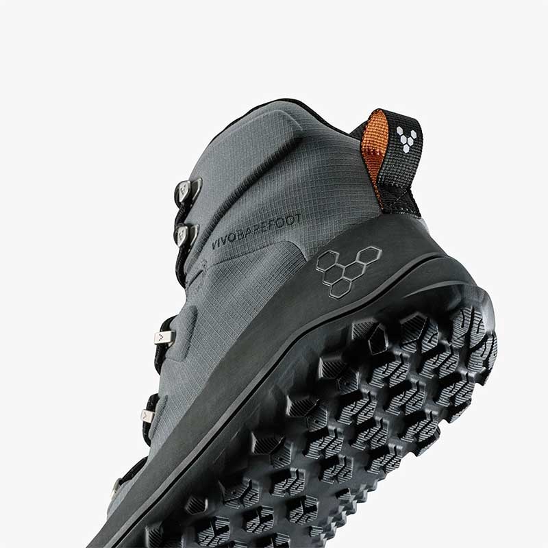 Vivobarefoot Men's Boot Tracker Textile AT - Dark Shadow, angled view showing the sole and heel.