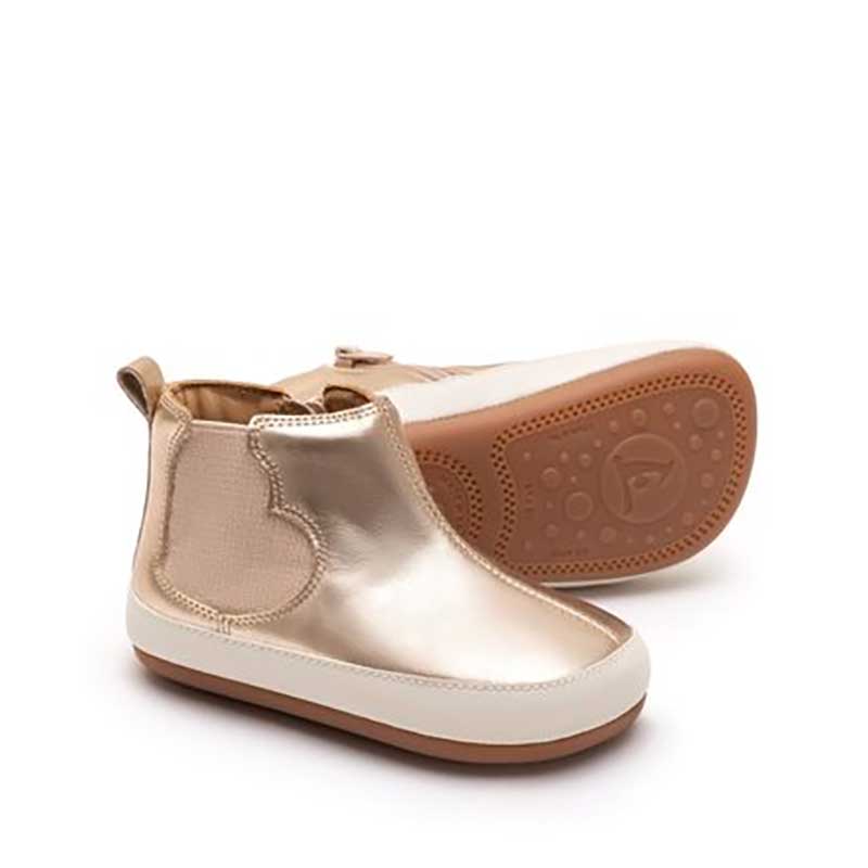 Pair of Tip Toey Joey Toddler Boots One Love - Metallic Salmon, one on its side showing the sole view and the other, angled showing the outer side and front view.
