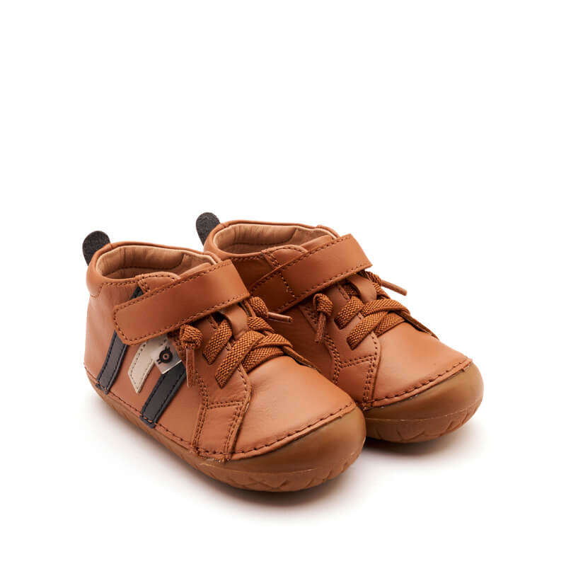 Pair of Old Soles Away Pave Boots - Tan, angled view showing outer side and front.