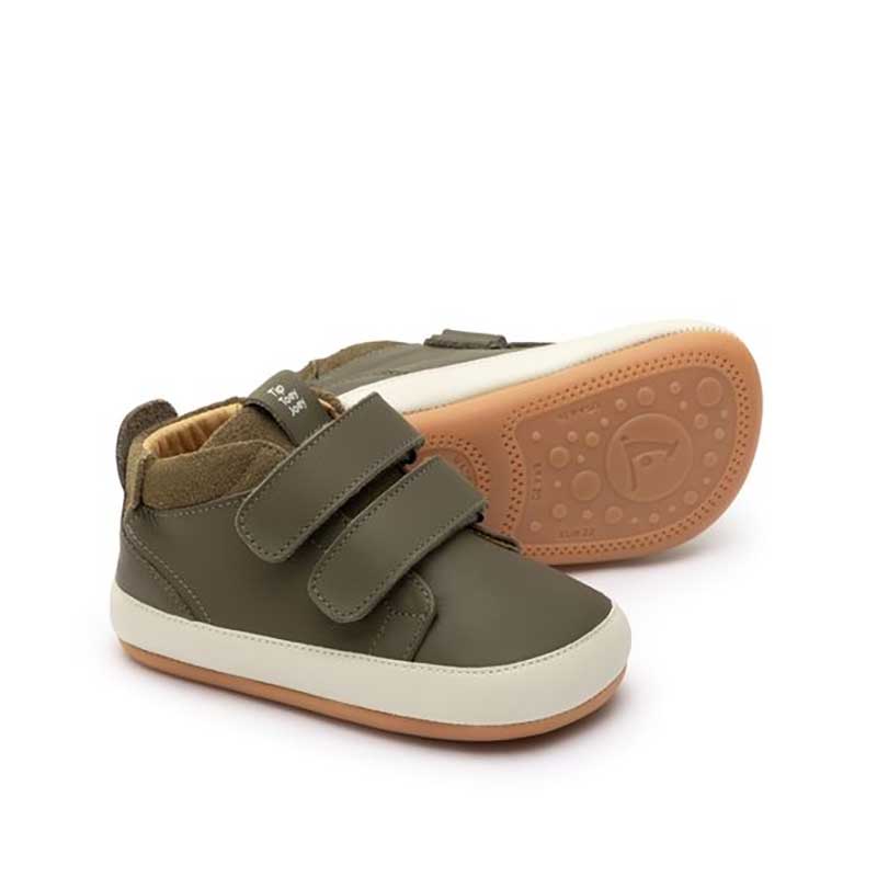 Pair of Tip Toey Joey Toddler High Top Trainers Cascade - Mineral Green and Olive Suede, one on its side showing the sole view and the other, angled showing outer side and front view.