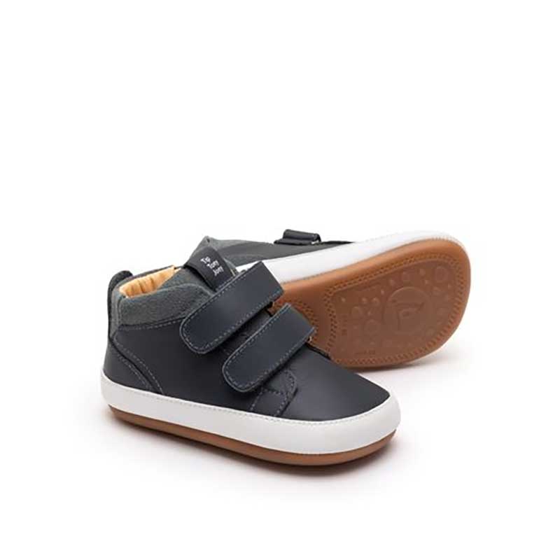 Pair of Tip Toey Joey Toddler High Top Trainers Cascade - Navy and Urban Blue Suede, one on its side showing sole view and the other angled, showing outer side and front view.