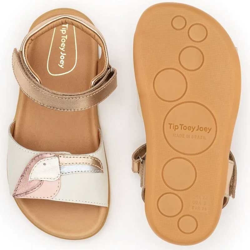 Pair of Tip Toey Joey Kids Sandals Toucan - Metallic Pink, one showing the top view and the other showing the sole view.