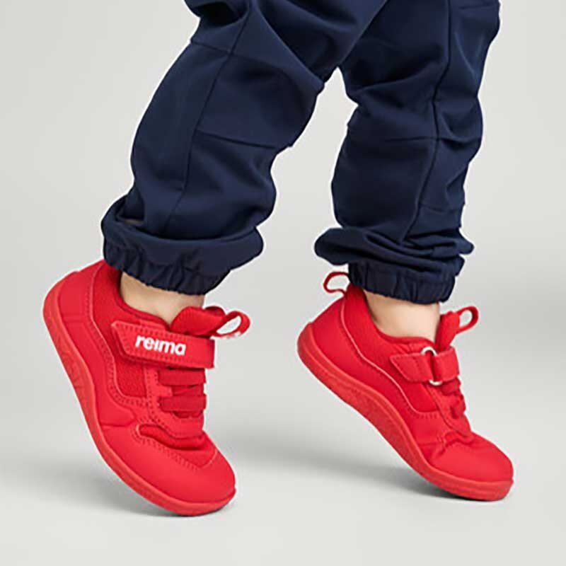 Child wearing Reima Kids Trainers Telmin - Reima Red.