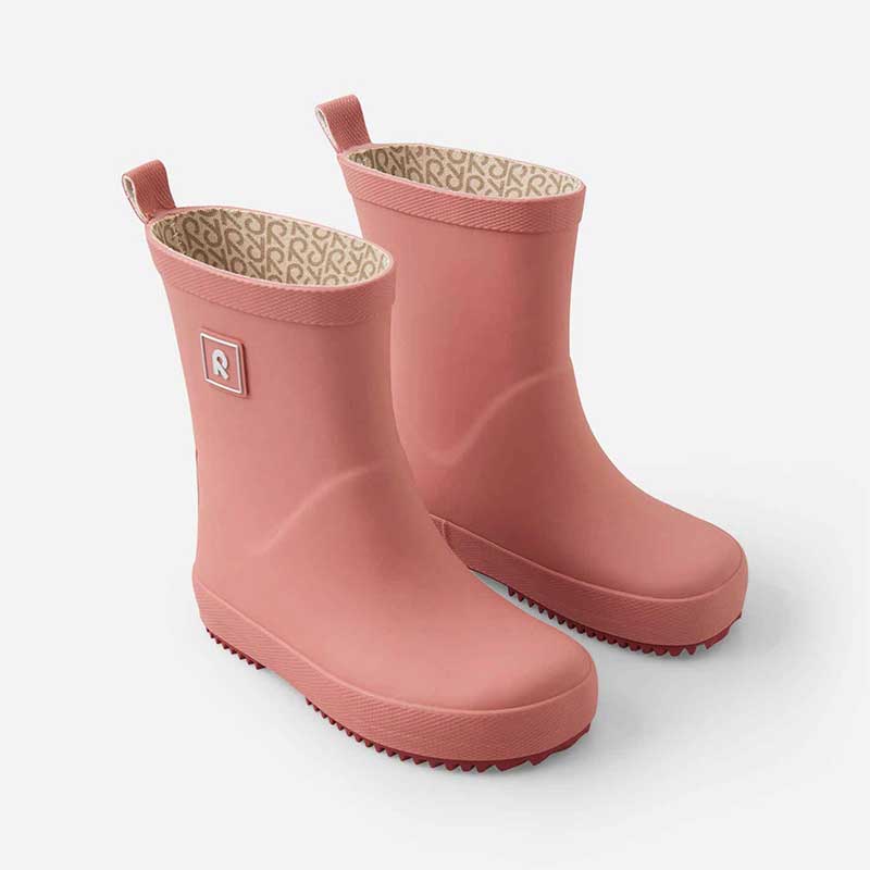 Pair of Reima Kids Wellies Ankka - Rose Blush, angled view showing outer side and front.