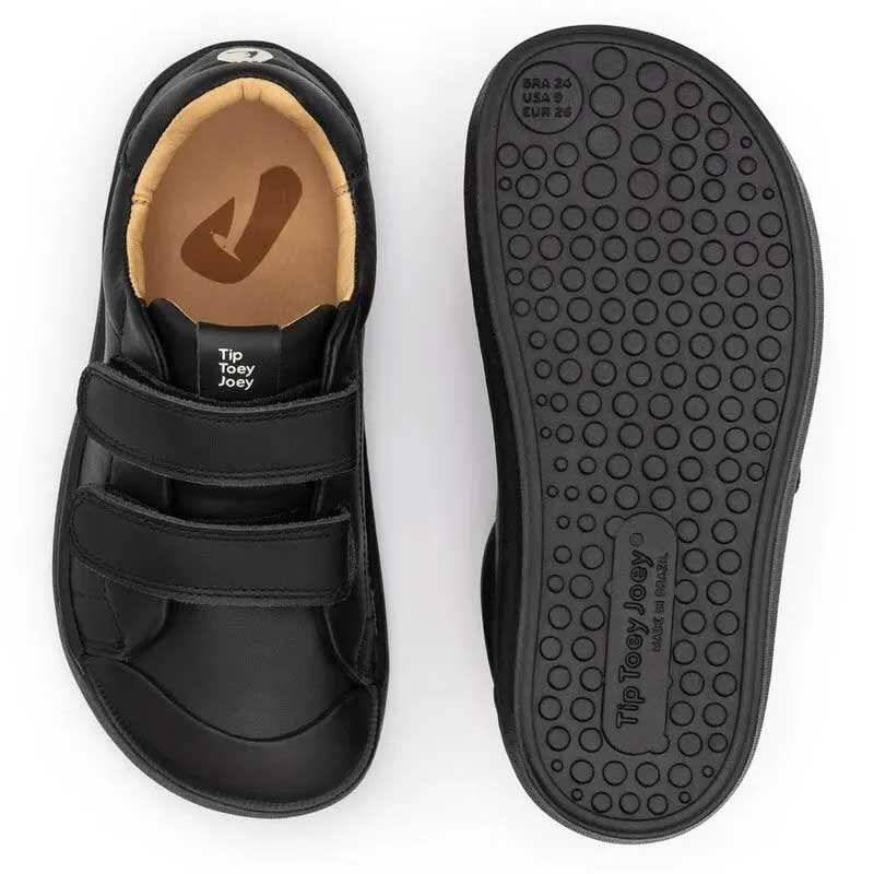 Pair of Tip Toey Joey Kids School Shoes Ramp - Black, one showing the top view and the other showing the sole view.