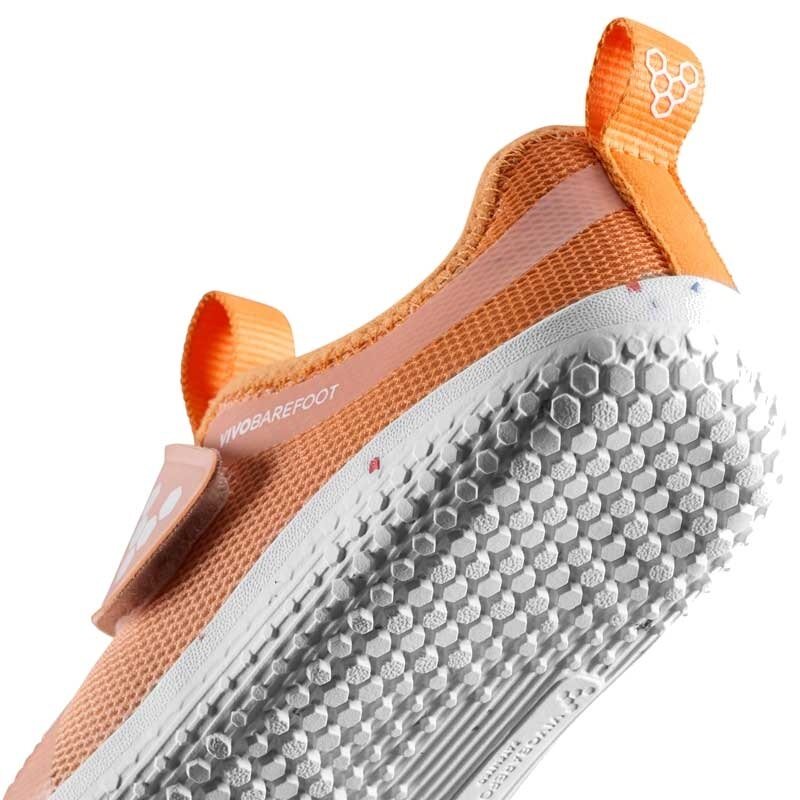 Vivobarefoot Kids Trainer Primus Sport IV - Apricot, angled view showing the sole.
