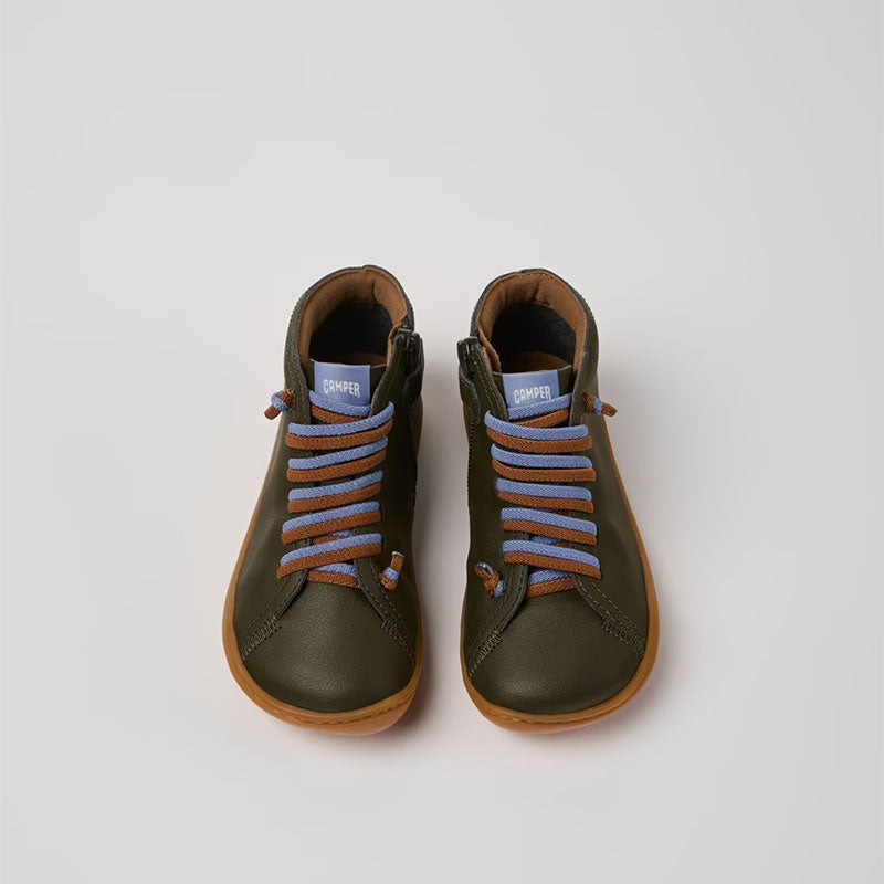 Pair of Camper Kids Peu Boots in green, front view.