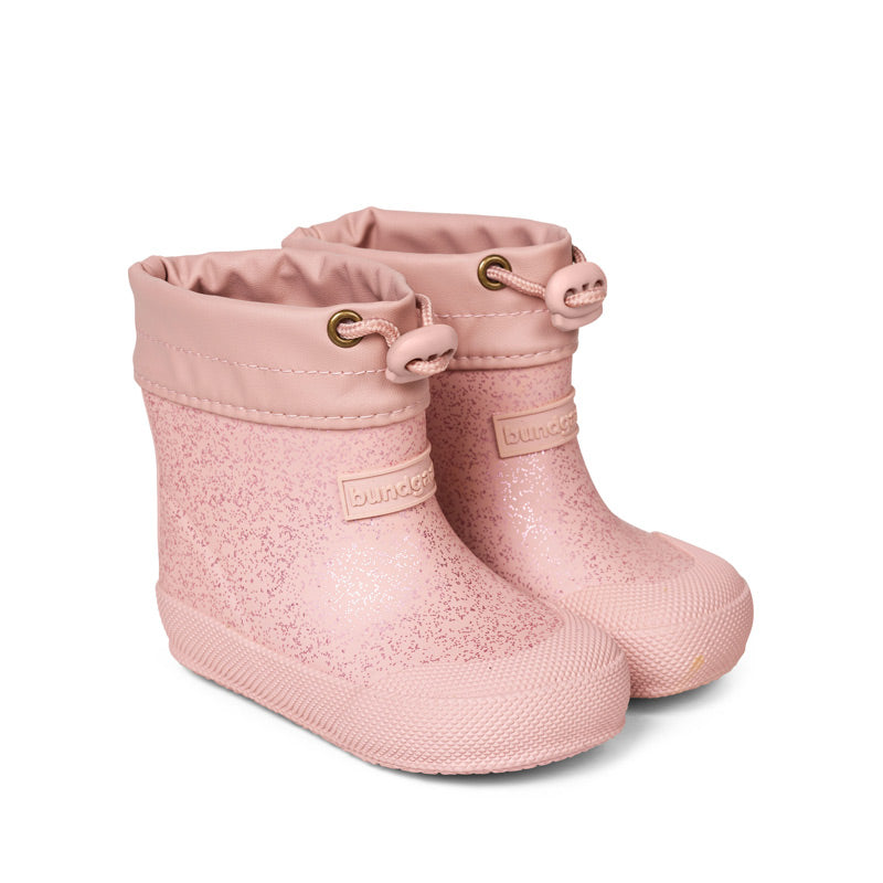 Pair of Bundgaard Toddler Wellies Malik - Rose Sparkle, angled view showing outer side and front.