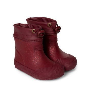 Pair of Bundgaard Toddler Wellies Malik - Berry Sparkle, angled view showing outer side and front.