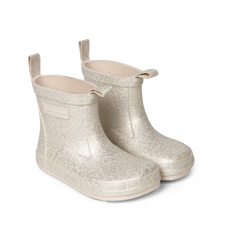 Pair of Bundgaard Kids Wellies Misty - Ivory Sparkle, angled view showing outer side and front.
