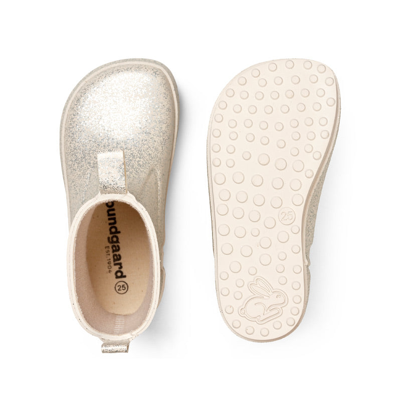 Pair of Bundgaard Kids Wellies Misty - Ivory Sparkle, one showing the top view and the other showing the sole view.