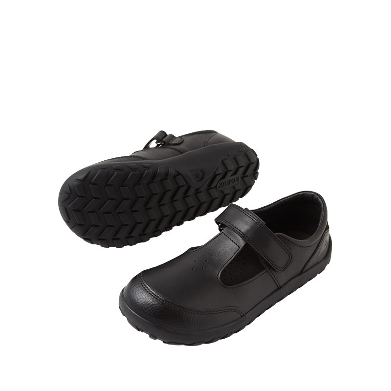 Pair of Bobux Alpha Becky School Shoes - Black, one on it's side showing the inner side and sole view and the other showing the top, front and outer side view.