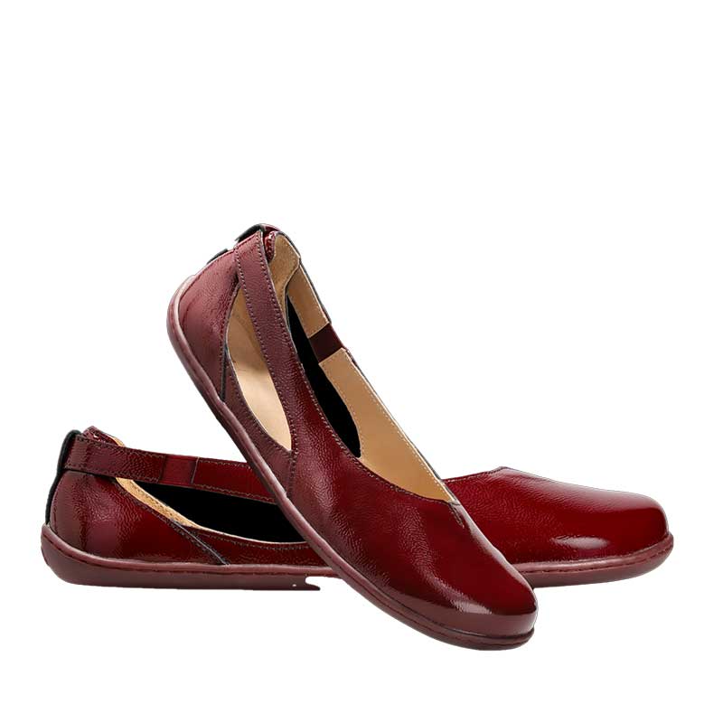Pair of Be Lenka Women's Ballet Shoes Bellissima 3.0 - Burgundy, one leant against the other. One showing the outer side view and the other slightly showing the inner side view.