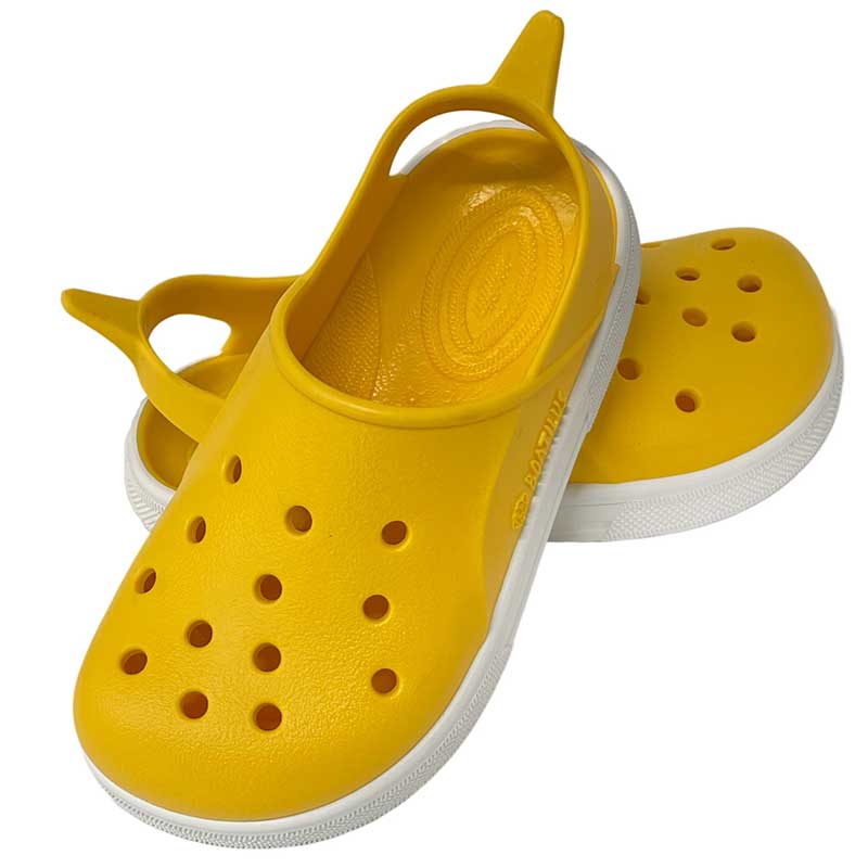 Pair of Boatilus Cloggy Sandals - Yellow White, one resting against the other showing the outer side and top view.