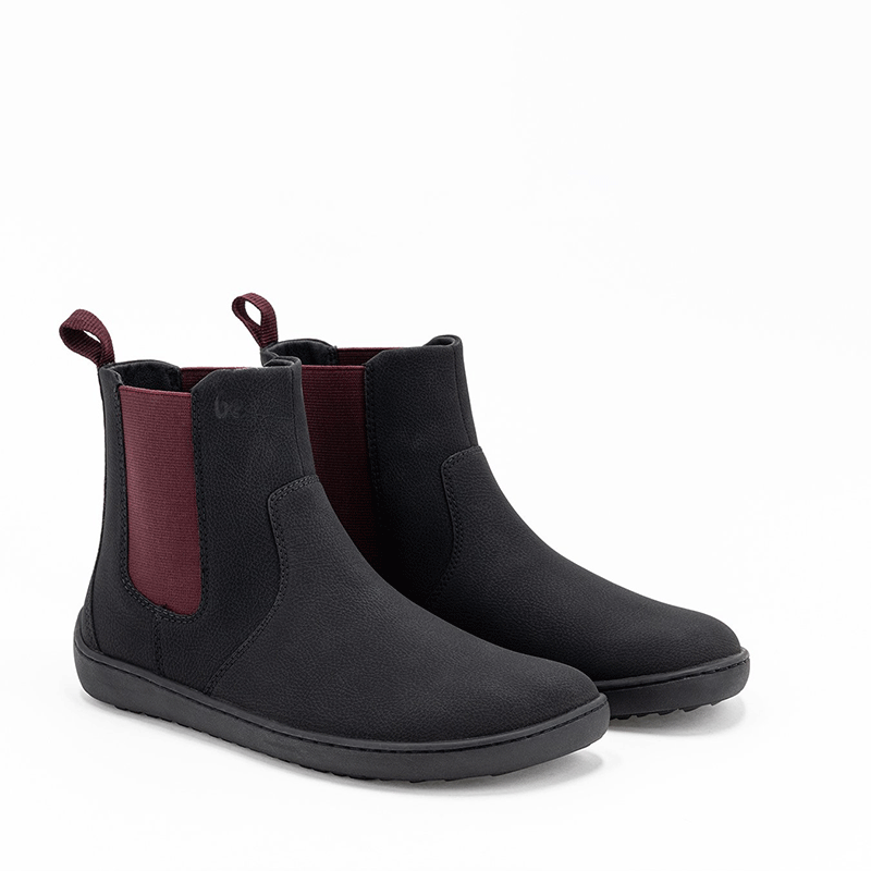 Pair of Be Lenka Adults Boots Entice 3.0 Vegan - Black, angled view showing outer side and front.
